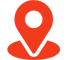 A red map pin on top of a black background.